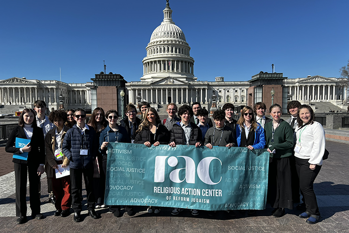 Photo of a group of teens standing in front of the capital building for L'Taken 2025