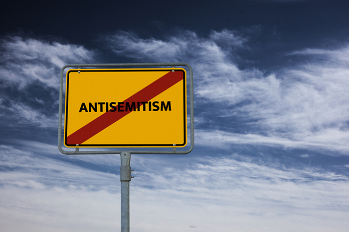 Sign with the word antisemitism and a red line through it