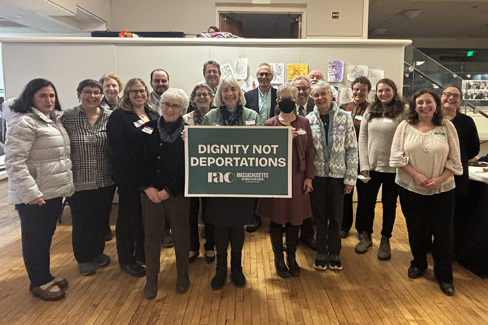 Photo of a group of twenty-five RAC-MA, Jewish Alliance for Law and Social Action (JALSA), and Unitarian Universalist (UU) Mass Action volunteers and congregational leaders who traveled to the State House for our Dignity Not Deportations Advocacy Day