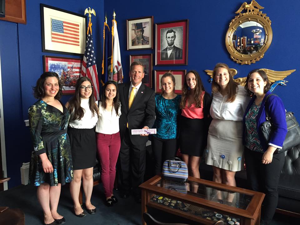 Amy Singer, interfaith coalition members meet with Rep. Dold