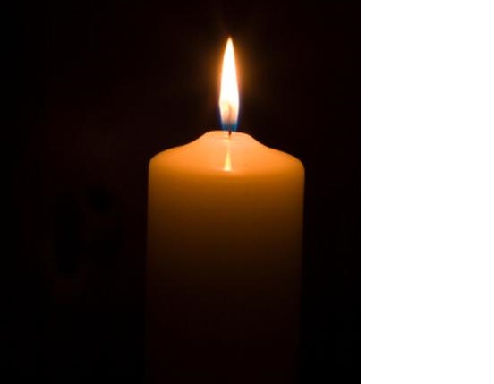 candle against dark background