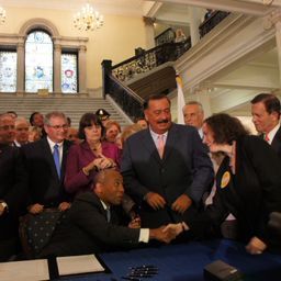 Gov Deval Patrick shakes Cindy Rowe