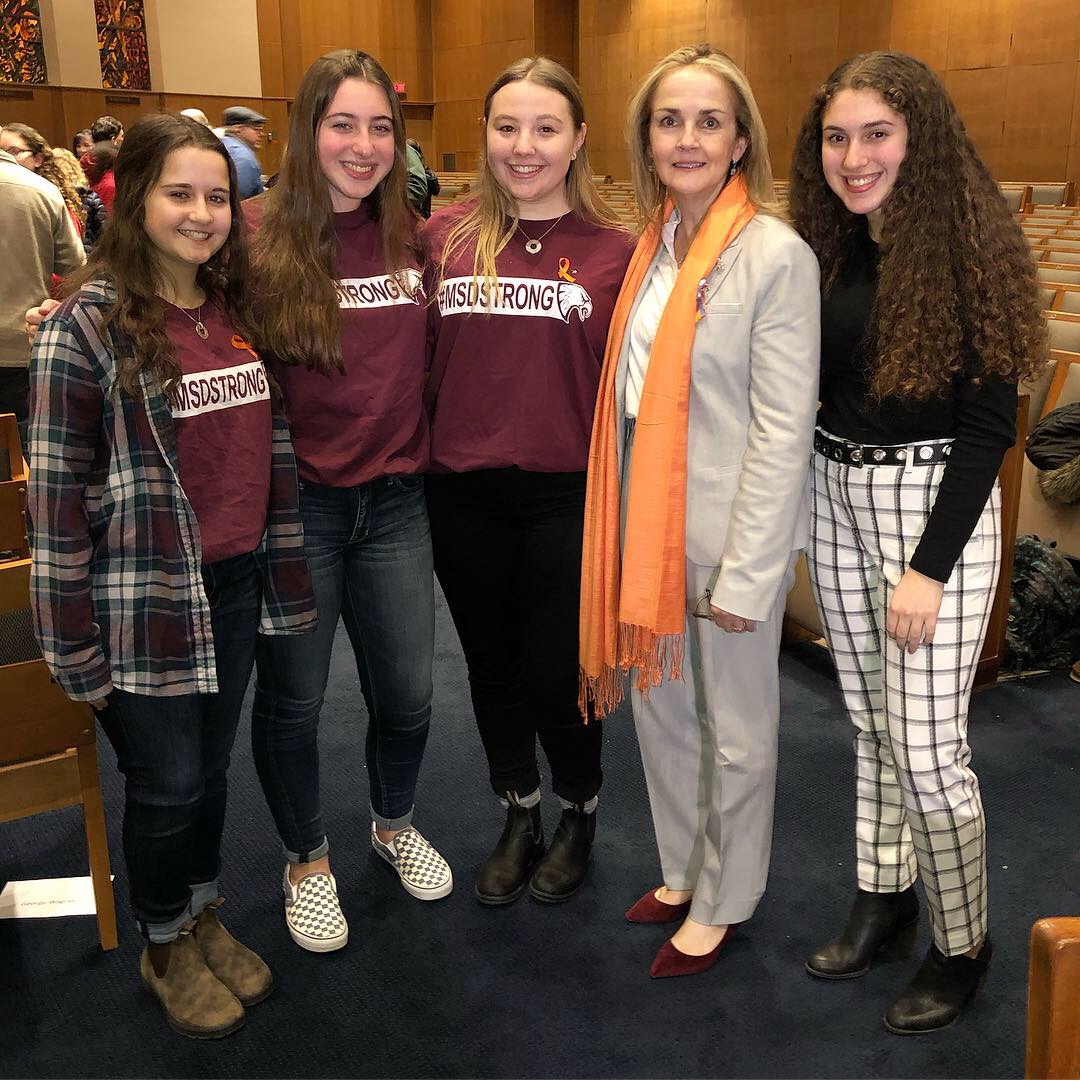 Student organizers pose with Congresswoman Madeleine Dean