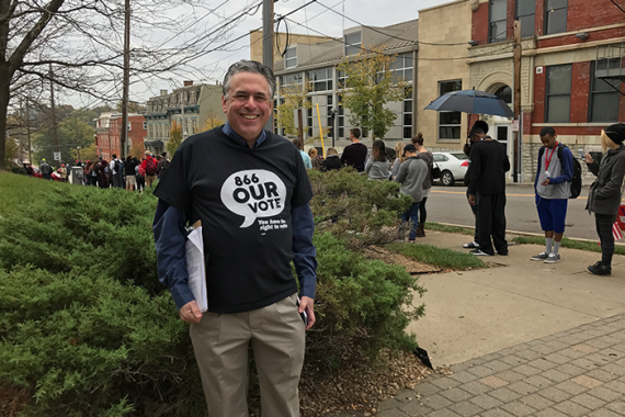 Person with Black shirt that reads "866 Our Vote"