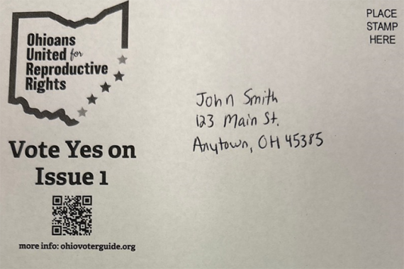 an image of an example postcard that says "Ohioans United for Reproductive Rights" and "Vote Yes on Issue 1" with a sample address on it that say "John Smith 123 Main St. Anytown, OH, 45385