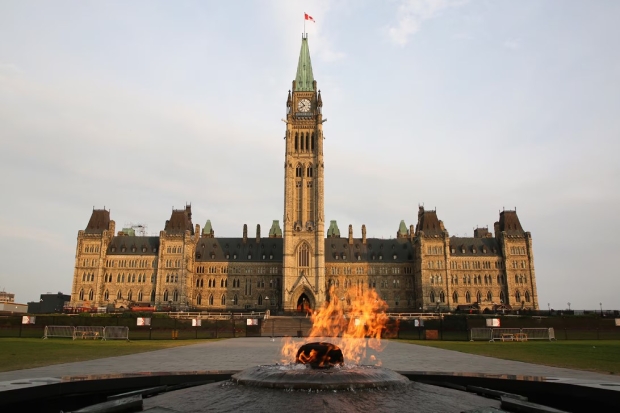 The Centennial Flame, which commemorates Canada's 100th anniversary as a Confederation, burns in front of the Centre Block building in Ottawa.