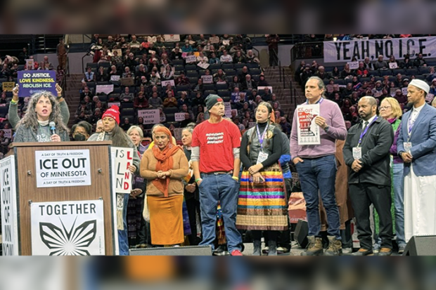 Rabbi Arielle Lekach-Rosenberg from Shir Tikvah in Minneapolis delivering a benediction