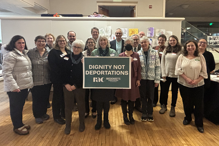 Photo of a group of twenty-five RAC-MA, Jewish Alliance for Law and Social Action (JALSA), and Unitarian Universalist (UU) Mass Action volunteers and congregational leaders who traveled to the State House for our Dignity Not Deportations Advocacy Day