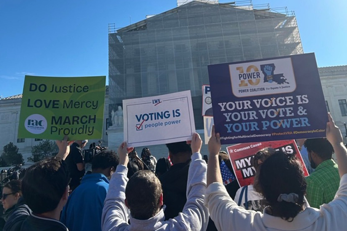 Photo of a group of protestors at a voting rights rally outside of the US Supreme Court 10-2025