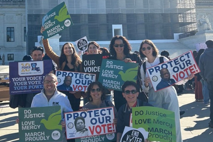 Photo of a group of protestors at a voting rights rally r Speaks at V 10-2025