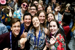 Smiling teens posing in a large group at NFTY Convention 