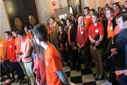 Group shot of hundreds of teens wearing orange Tshirts on a lobbying visit at the Ohio statehouse 