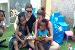 The author working with refugee children in Israel