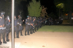 Police in riot gear outside Central Reform Congregation, St. Louis, MO